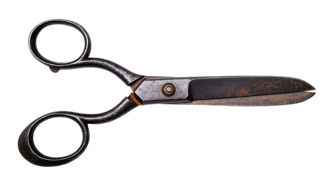 Antique metal tailor scissors with worn blades, isolated on transparent background