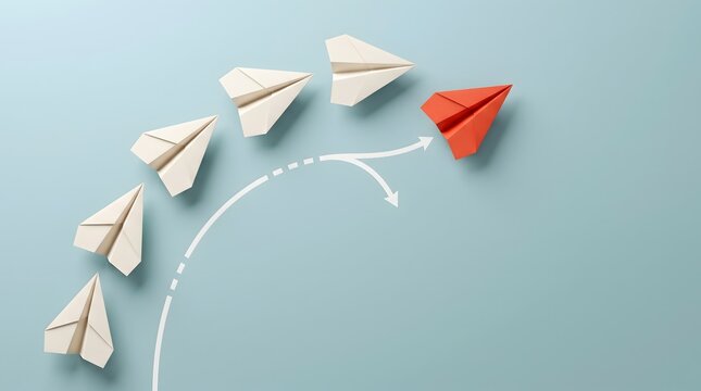 Disruptive thinking and market divergence represented by red paper airplane taking an alternative path