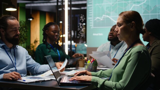 Diverse employee team develops strategy for business objectives