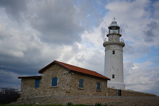 Paphos lighthouse ancient white tower and stone house in Cyprus