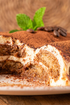 Delicious homemade tiramisu cake topped with cocoa