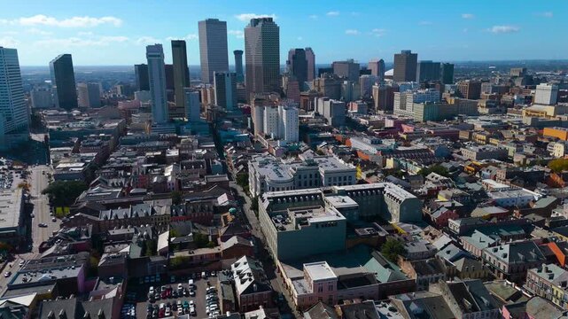 Aerial Drone Pan Over Historic French Quarter to Downtown New Orleans Skyline on Sunny Day