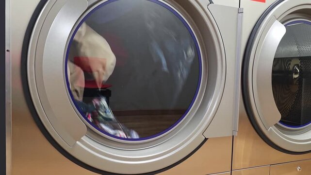 Clothes dry in the self-service laundromat