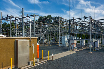 Naklejka premium Industrial power grid equipment fills an outdoor electrical distribution facility in Virginia.