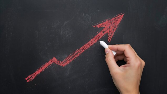 Generative AI depicts a hand drawing an upward trending arrow on a blackboard