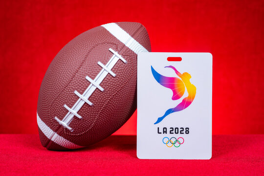 ZhongShan GuangDong China-August 23, 2026: Flag football next to LA2028 Olympic Games credential badge.