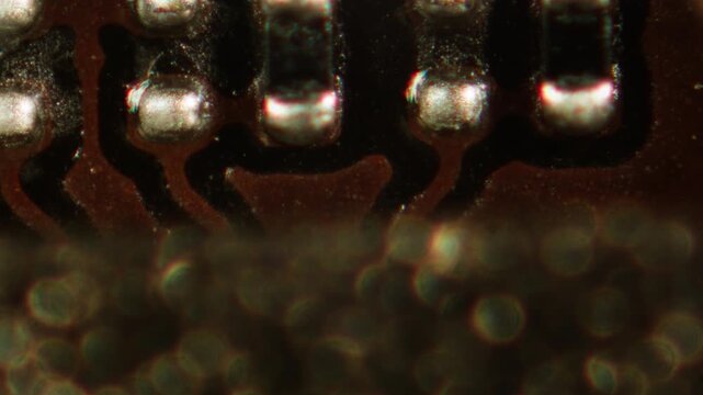 Microscope Macro Close-up Shot of Microchip, CPU Processor on Printed Circuit Board, Computer Motherboard with Components Inside of Electronic Device, Part of Supercomputer microscop.