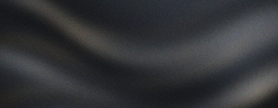 Black silk fabric texture with elegant wavy folds, luxury dark satin cloth background for fashion design. Smooth charcoal textile drapery, premium matte black material for formal backdrop.