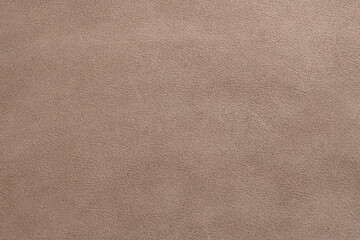 Naklejka premium Close up of brown suede or nubuck leather texture background
