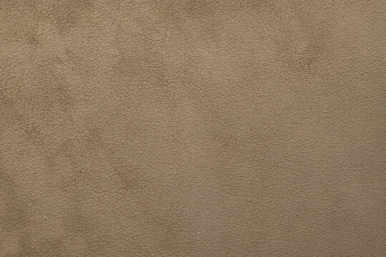 Close up of taupe or light brown suede leather texture