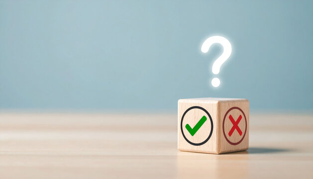Wooden cube with tick mark and cross mark representing a yes or no choice