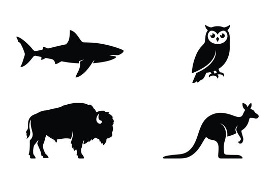Animal collection including shark, owl, buffalo and kangaroo in vector silhouettes
