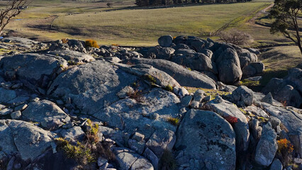 Fototapeta premium Aerial View of Granite Boulders and Rural Landscape in Uralla