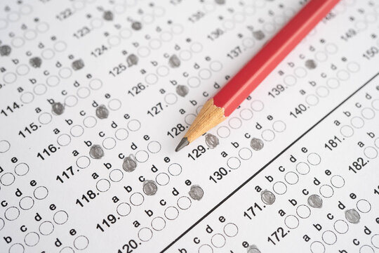 Answer sheets with pencil drawing fill to select choice, education.