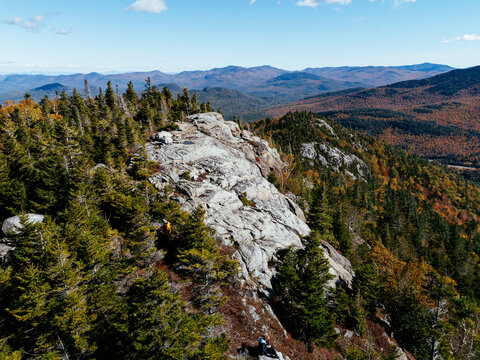Fall Colours in the White Face Mountain ski resort and lake. Color Change, Vermont, USA.