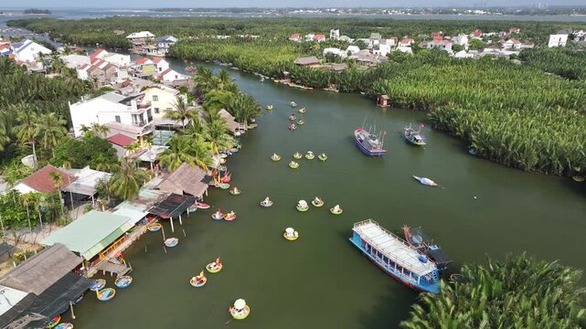 Aerial view of the natural scenery of basket boats on the Thu Bon River in Hoi An Ancient Town, Vietnam