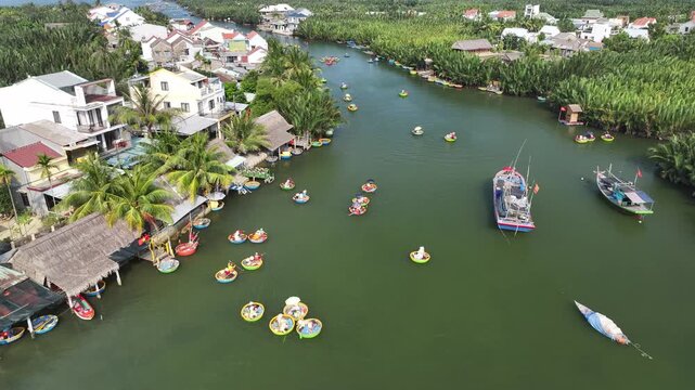 Aerial view of the natural scenery of basket boats on the Thu Bon River in Hoi An Ancient Town, Vietnam