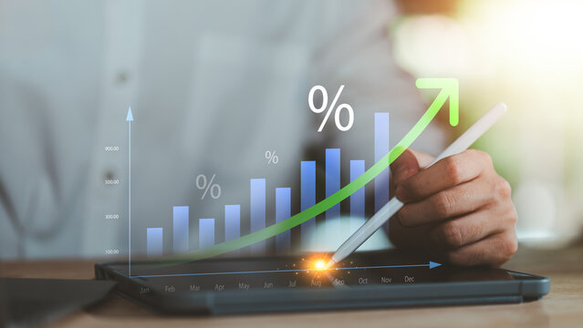 Financial analyst evaluates financial growth, investment returns, revenue performance, profit increase, interest rates, market trends, portfolio growth, return analysis for strategic planning.