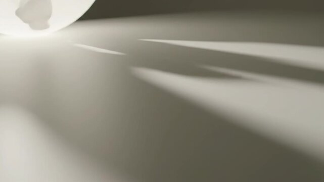 Abstract light and shadow play on a white surface for backgrounds