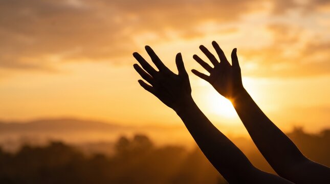 Silhouette of human hands reaching up towards the golden sunset sun rays, spiritual freedom and hope, worship prayer gesture, mindfulness meditation pose, summer vacation vibe