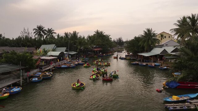 Aerial view of the natural scenery of basket boats on the Thu Bon River in Hoi An Ancient Town, Vietnam