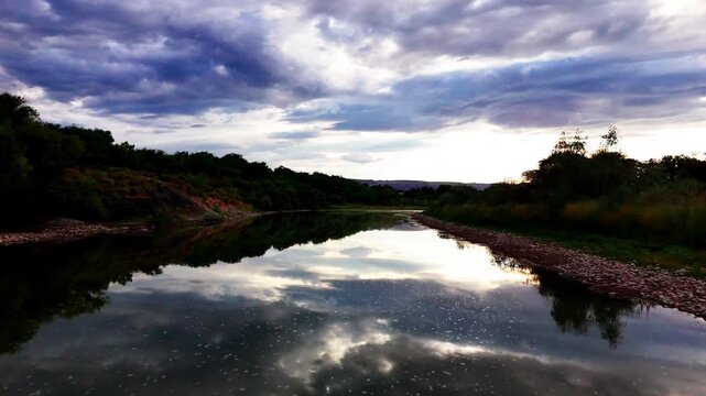 Flyover of the Colorado River during late summer in a bad draught season, located near Las Colonias Park in Grand Junction, Colorado.