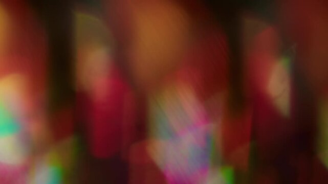 Rainbow effect. Blur flare spark. Defocused blue red shine flicker beam ray gleam blaze glimmer on abstract bokeh light on dark black art background.