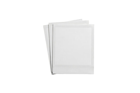 A stack of three empty white instant frames with square borders, isolated on a black background, for and memory concepts
