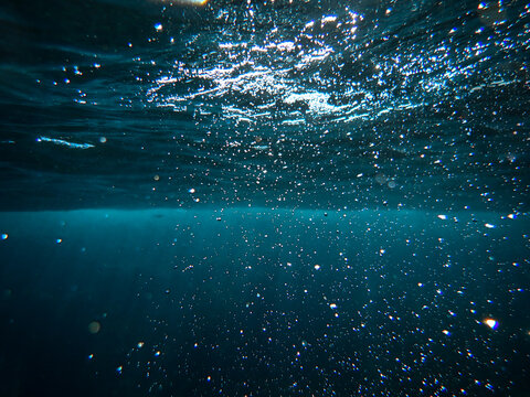 sea, underwater, sunlight, water, background, ocean, under, wave, blue, deep, undersea, light, rays, diving, marine, sun, abstract, surface, clean, texture, sunbeam, dark, clear, nature, aquatic sea.