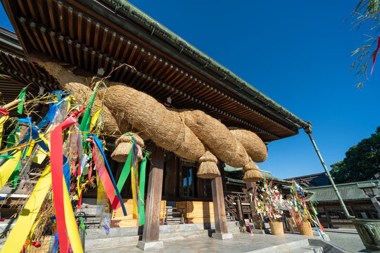 Miyajidake Shrine main hall with giant shimenawa sacred rope in Fukutsu, Fukuoka, Japan