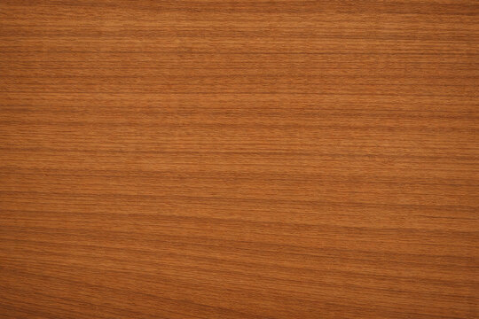 Natural teak wood texture with rich golden-brown tones, fine grain, and subtle organic variations. High-resolution seamless surface, ideal for furniture, flooring, cabinetry, interiors, and background
