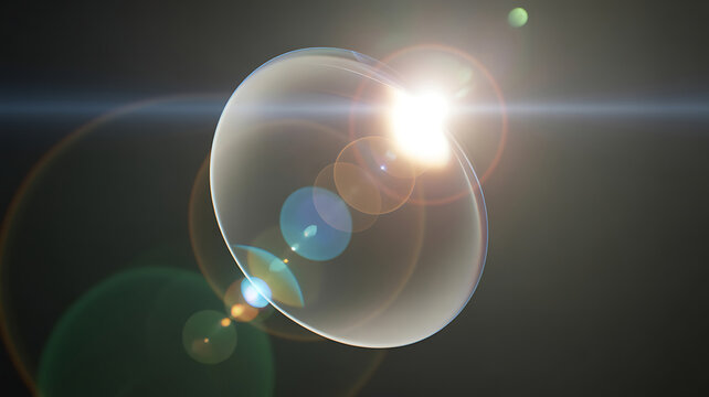 Bright lens flare with optical rings and starburst on a dark background starburst background