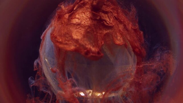 Ink leak. Sparkling fluid. Copper yellow blob spilling paint on diamond sphere. Shiny color blur curl blend abstract circle frame background.