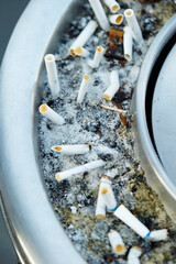 cigarette butts in ashtray © mnimage