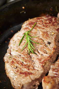 Beef steak in an iron pan
