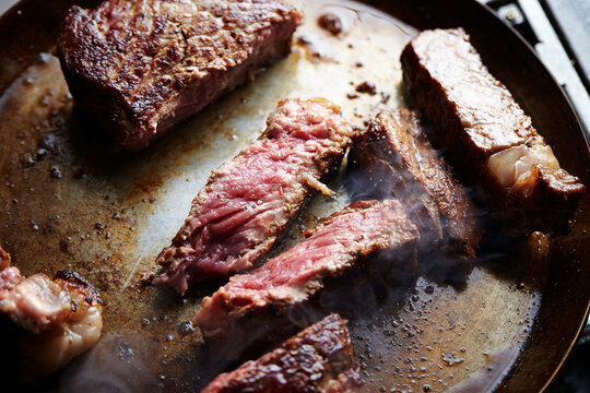 Beef steak in an iron pan