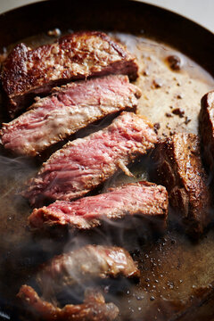 Beef steak in an iron pan