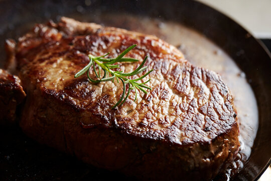 Beef steak in an iron pan