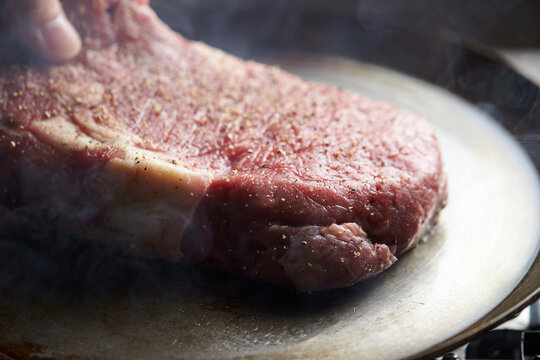 Beef steak in an iron pan