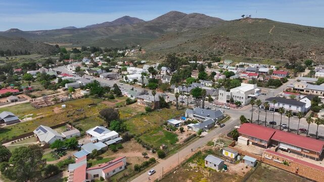 Aerial rises over charming Uniondale South Africa in the Little Karoo