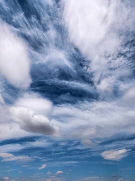 Expansive Cloudscape with Layered White Clouds