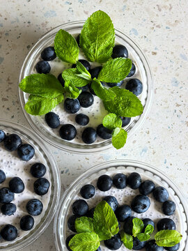 Chia Pudding With Blueberries and Fresh Mint Garnish