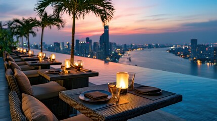 Naklejka premium Elegant rooftop dining experience at sunset overlooking a city skyline with river view and beautifully lit tables creating a warm atmosphere