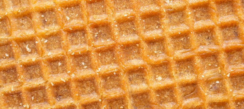 crunchy golden brown waffle wafer pattern texture background