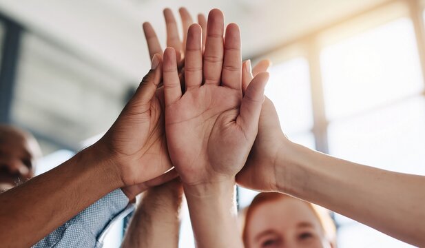 Team work and unity of diverse coworkers showing collaboration for team success