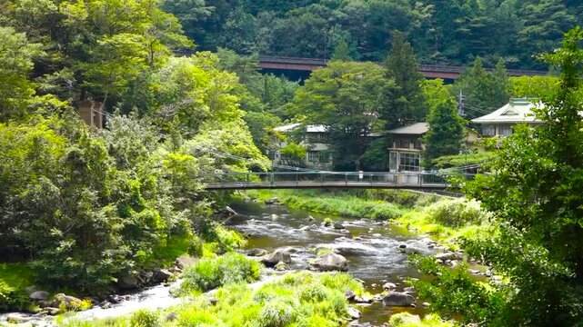 Kurenai Suspension Bridge and River Stream in Shiobara Onsen Resort, Nasushiobara, Tochigi, Japan