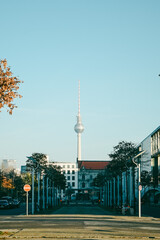 Berlin TV Tower framed by tree-lined street, Germany © gadalab