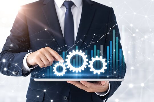 Businessman interacting with holographic gears and financial chart on tablet