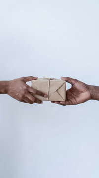 Gift exchange hands package delivery esg concept mutual aid sharing