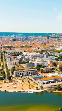 Vertical video. Nancy, France. Panorama of the central part of the city. Summer, Sunny day. Drone footage. Rich colors